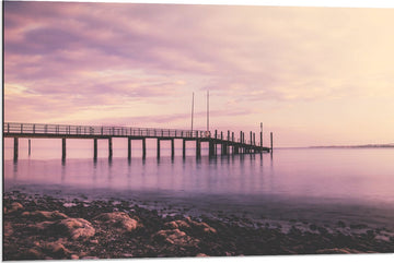 Dibond - Stijger op Zee met Roze Gloed - 90x60 cm Foto op Aluminium (Met Ophangsysteem)