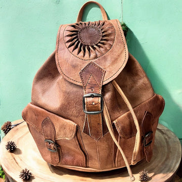 Festival rugzakje - MINI rugtasje - Leder/koeienhuid - bruin - Ibiza style - mini rugtas - handmade - uitgesneden zon